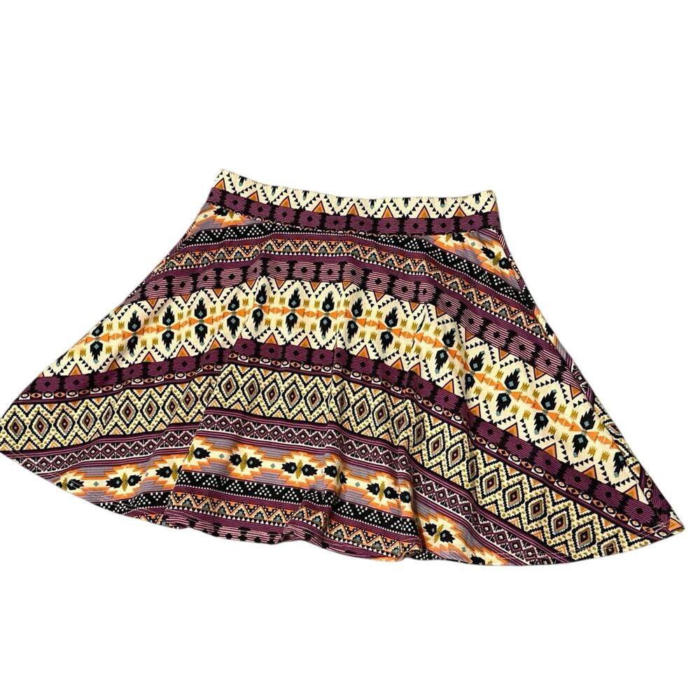 Vibe sports wear skirt size Lg. Multicolor indian type print.